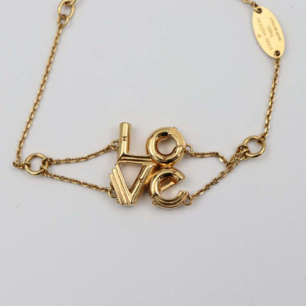 LOUIS VUITTON Gold Love Charm Bracelet - Picture 3 of 7